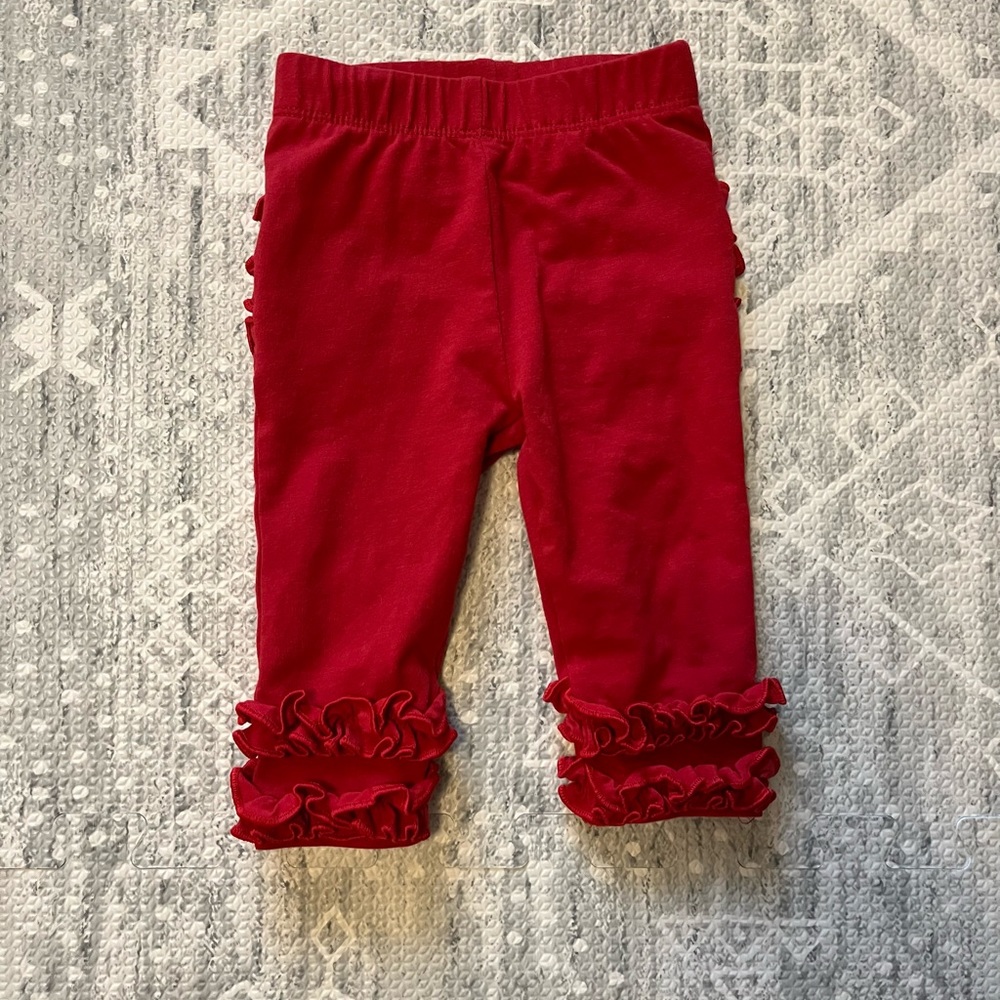 NWOT Rufflebutts red leggings size 0-6 months.